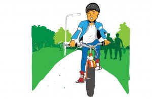 Pål cyklar på en cykelbana iklädd en blå jacka och röda skor